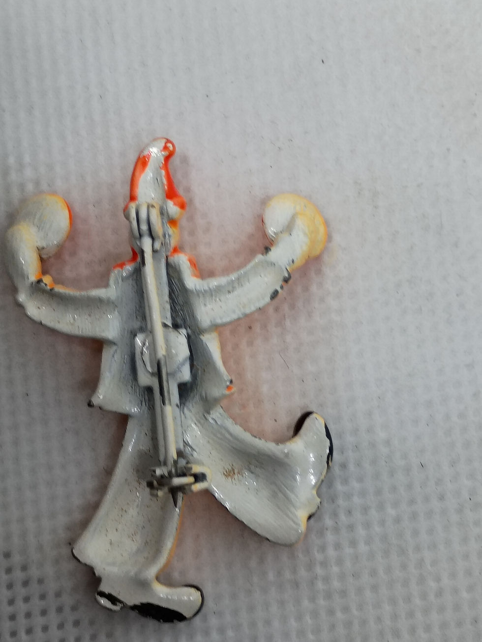 Thumbnail: 1.75"  vintage clown brooch features a faux pearl head and cymbals in hands