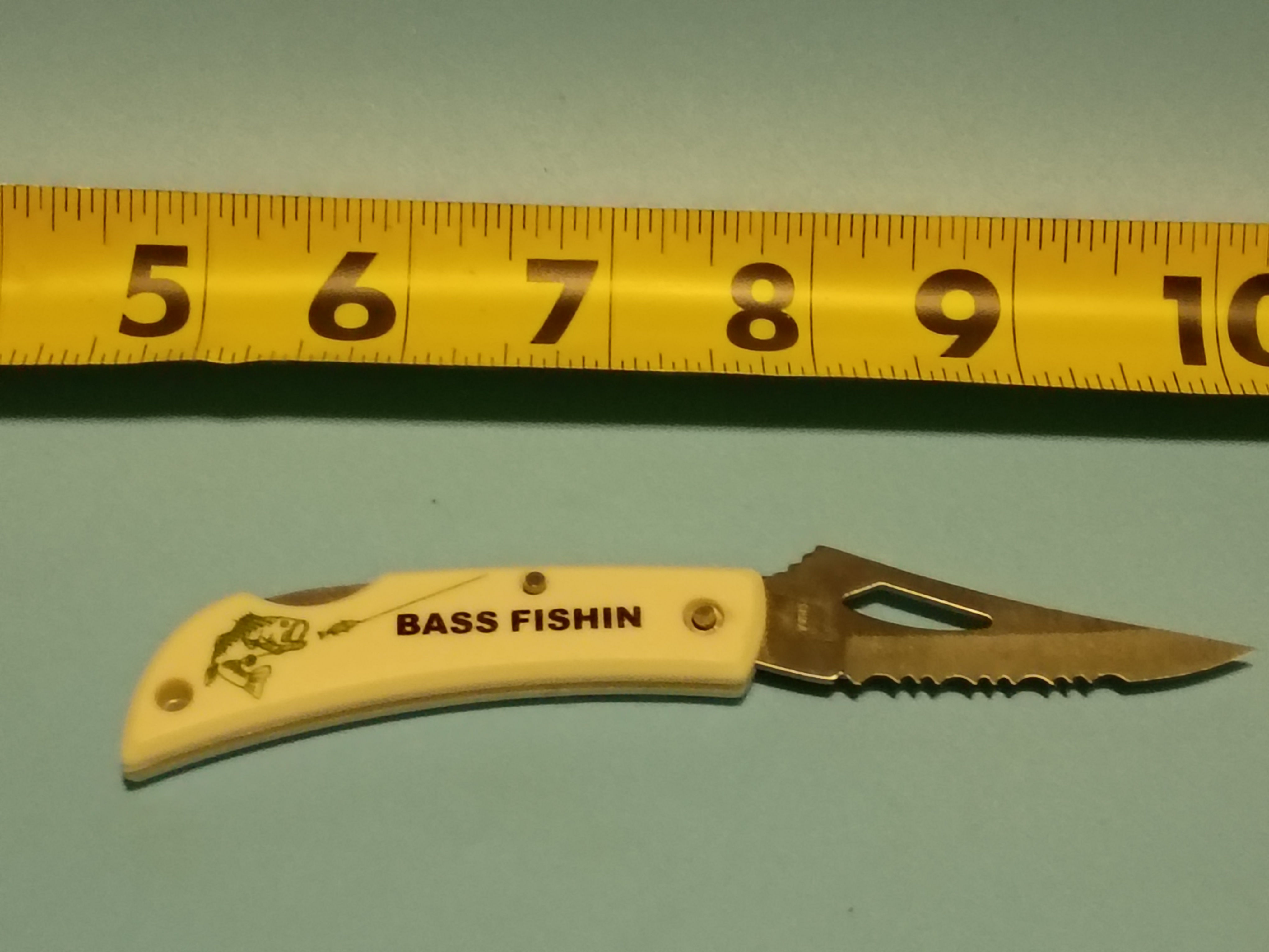 Approx 5" open -Folding knife- stainless steel blade- plastic handle BASS FISHIN