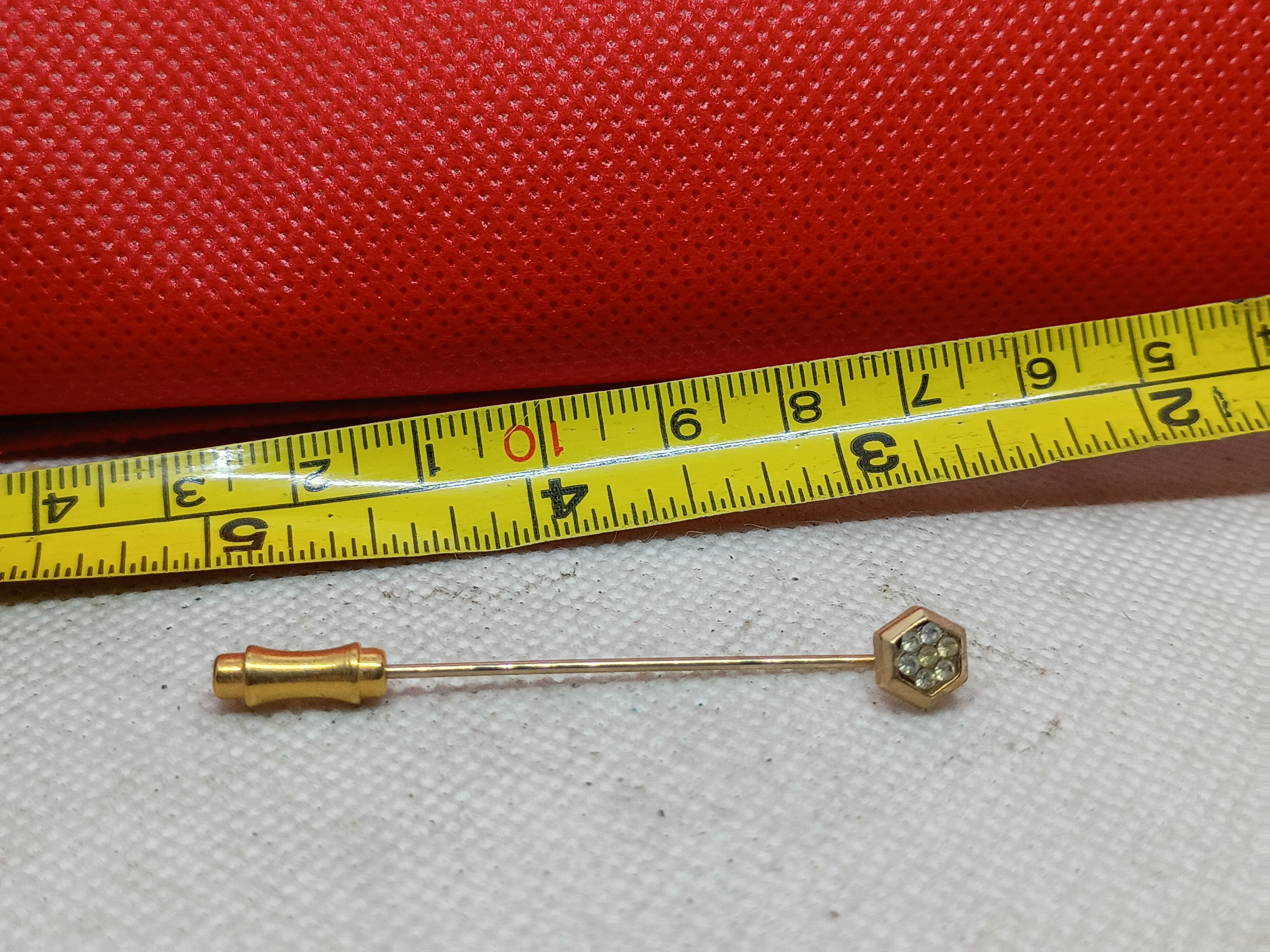2.25" A vintage gold-tone stick pin-head with cluster of small pave rhinestones
