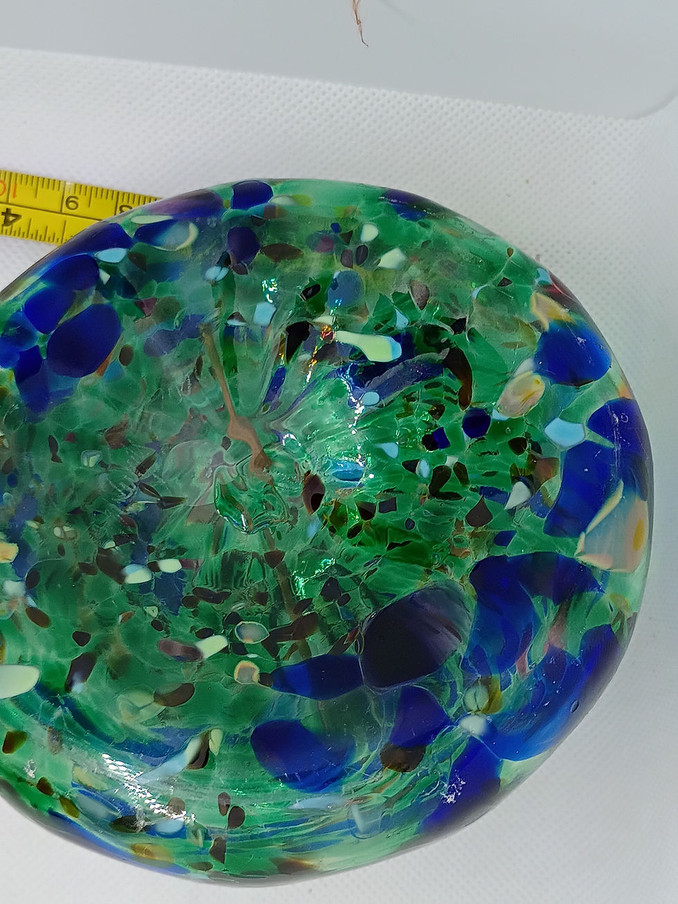 Thumbnail: 5" Unique round multicolored glass, with hole on top, not sure of use