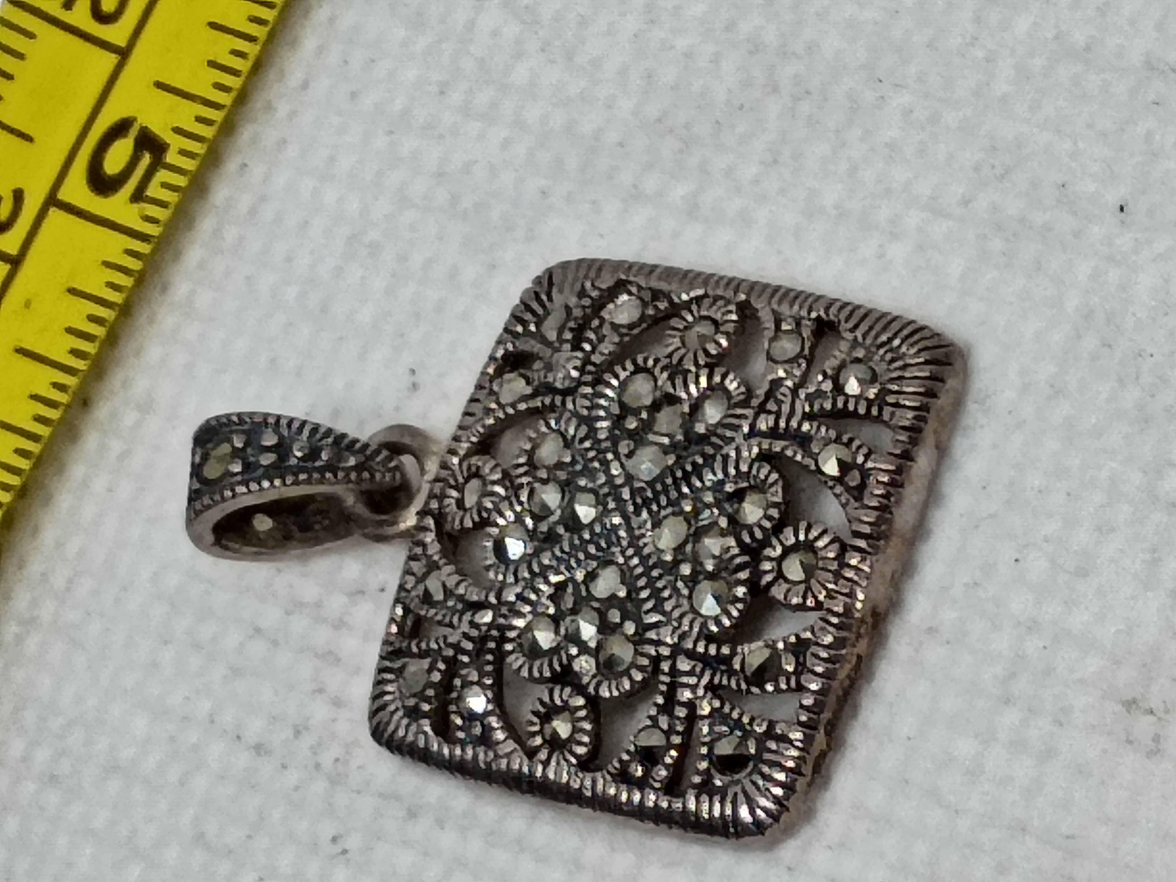 Approx. 1" sterling silver marcasite filigree pendant - made in Thailand