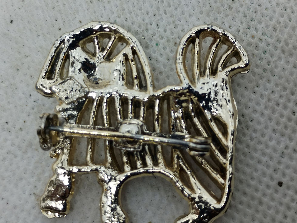 Thumbnail: Avon - vintage gold-tone open-work shaggy dog or Pekingese brooch pin