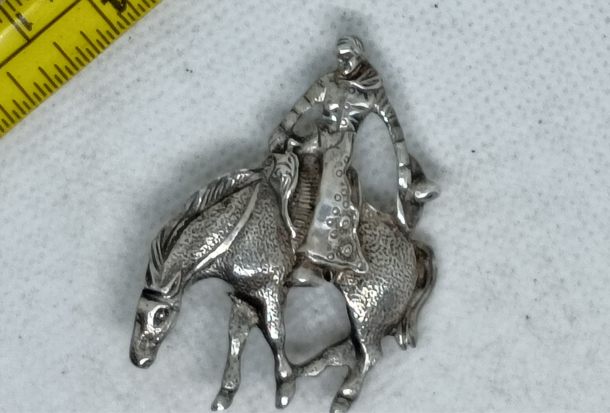 Approx.1.75" Sterling Silver Mexican cowboy (vaquero) on a horse repousse brooch