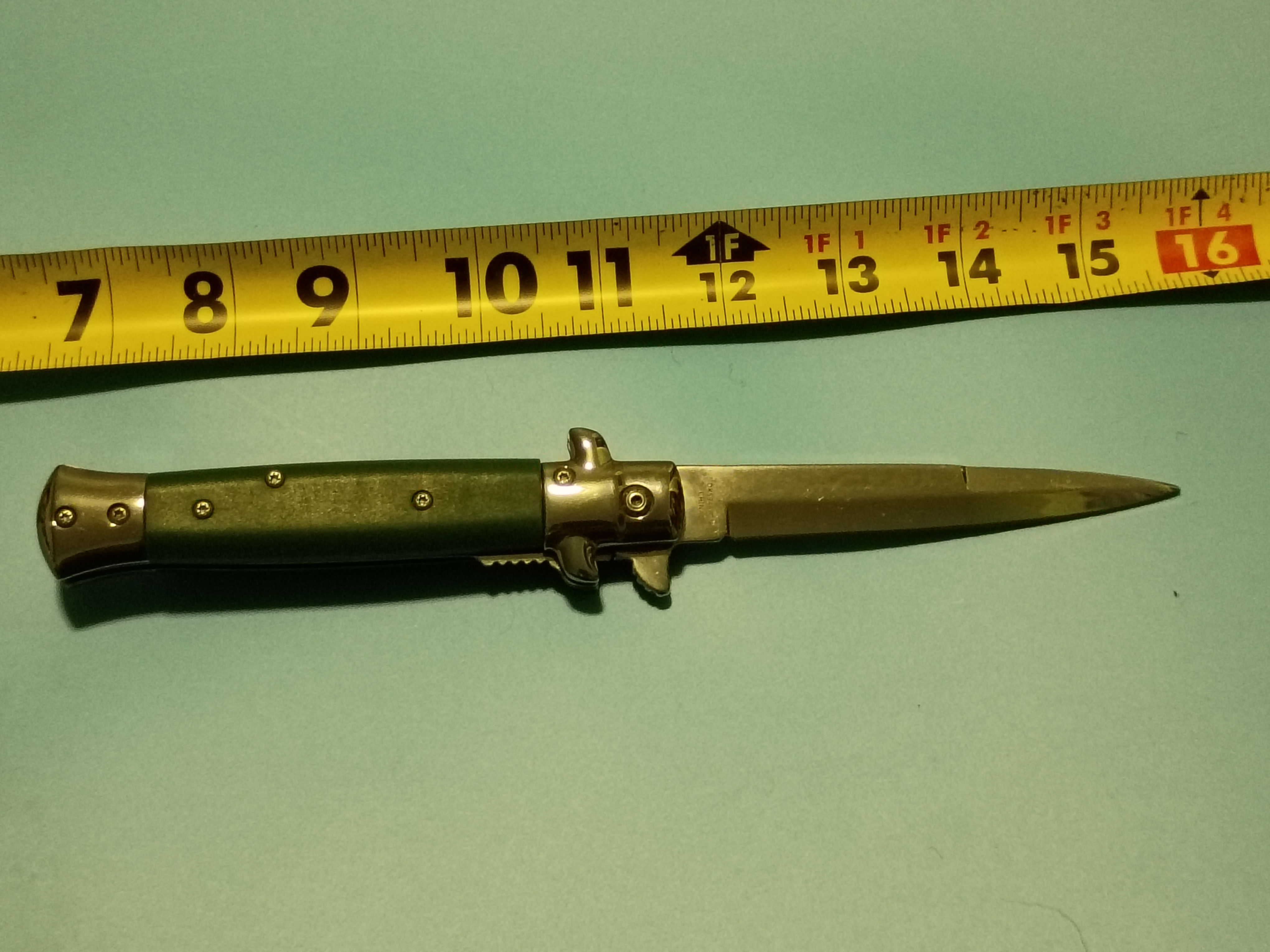 9"open -Folding knife -stiletto style- stainless steel blade- green handle -DUCK