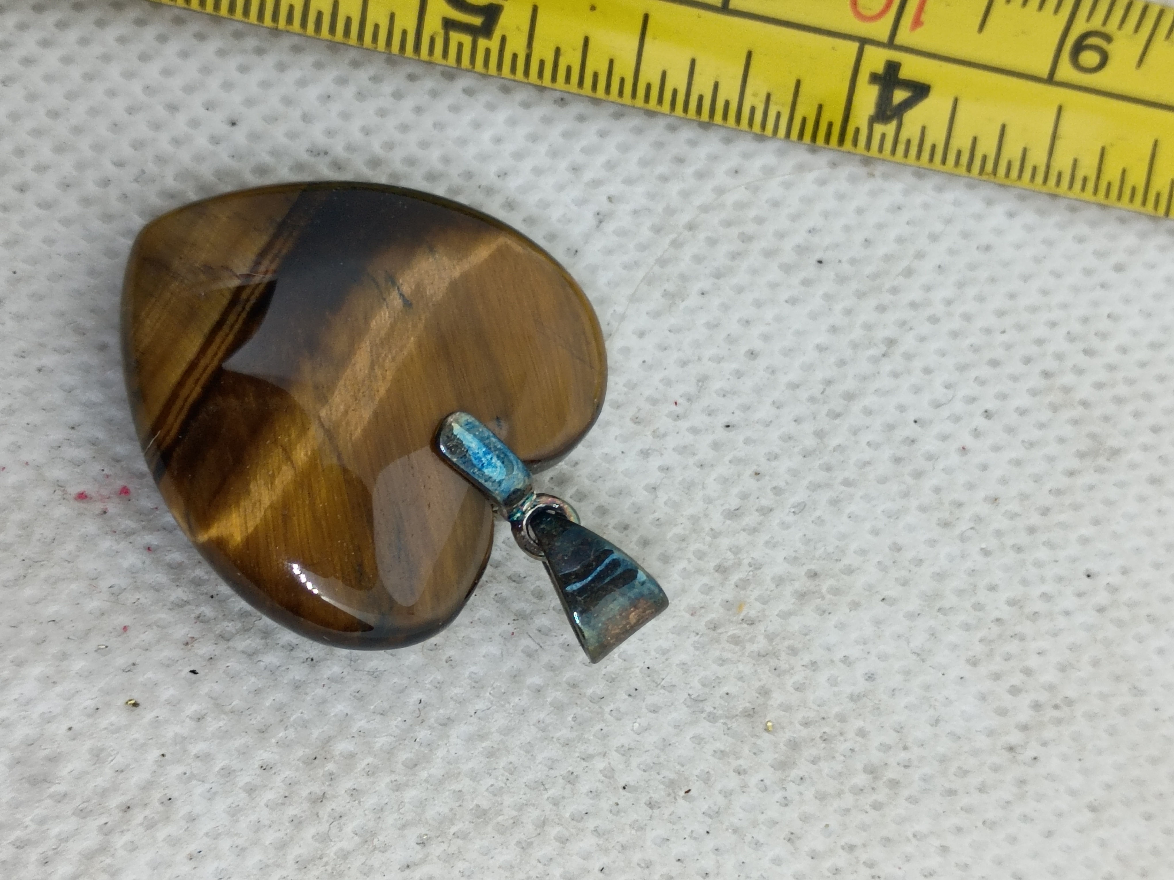 Approx.1"heart-shaped pendant - crafted from polished brown tiger's eye gemstone