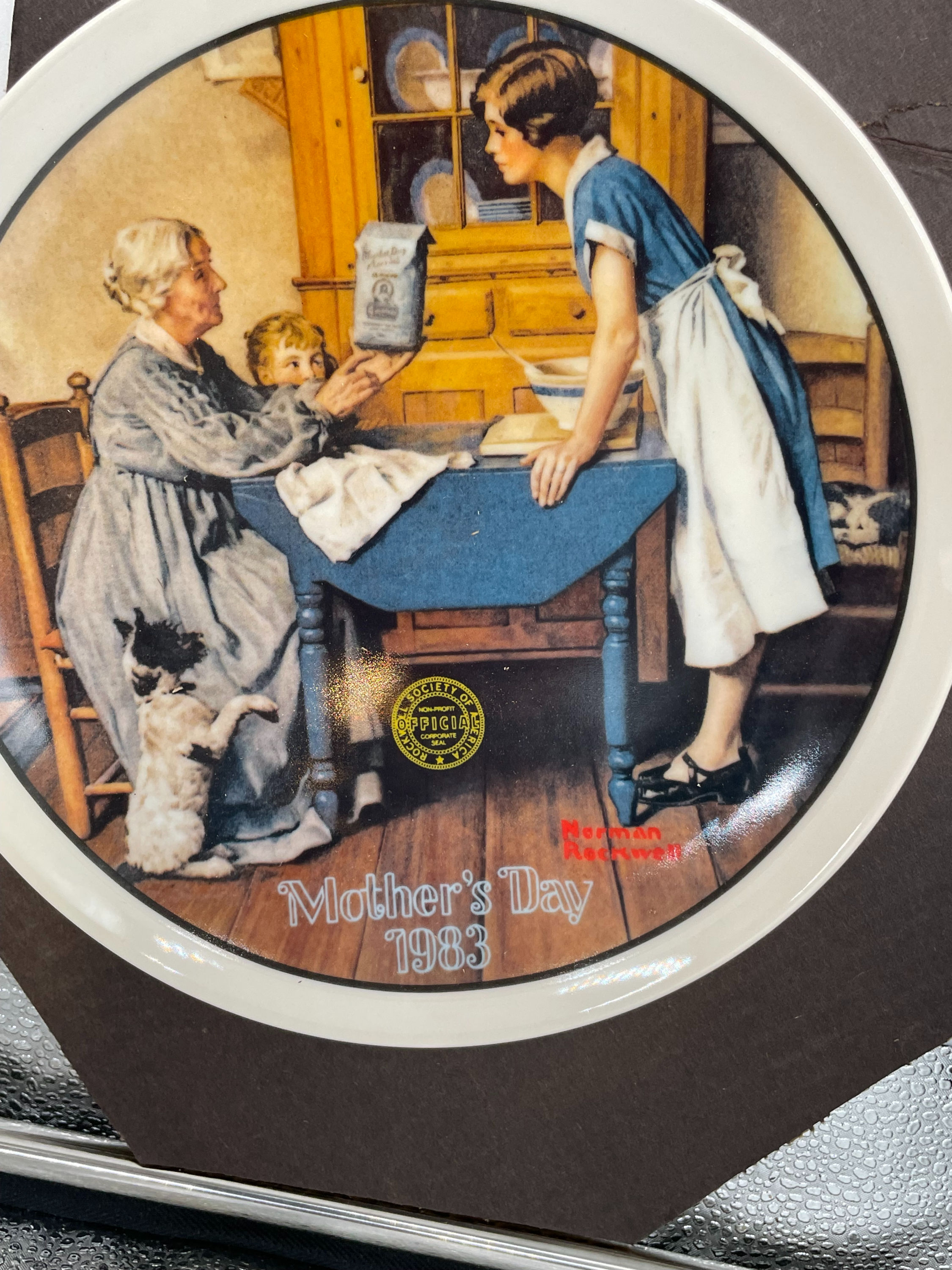 8" plate - "Add 2 Cups and a Measure of Love" - by Norman Rockwell