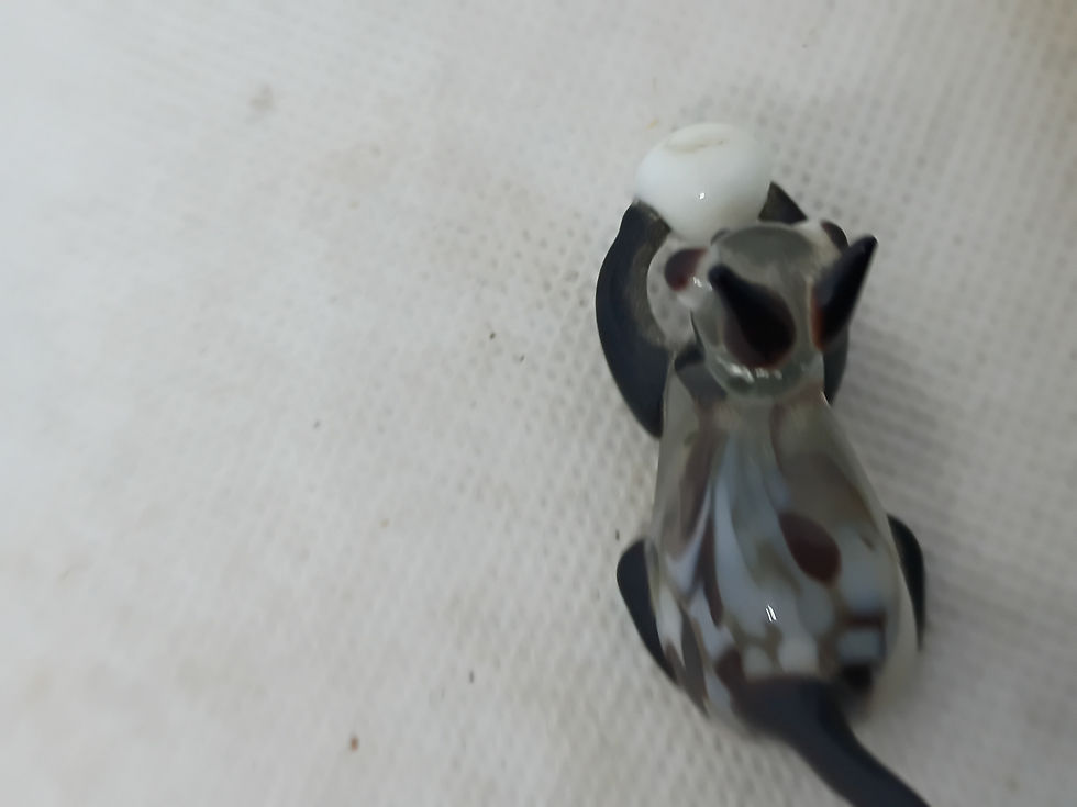 Thumbnail: 2.5" long  art glass cat playing with a ball -