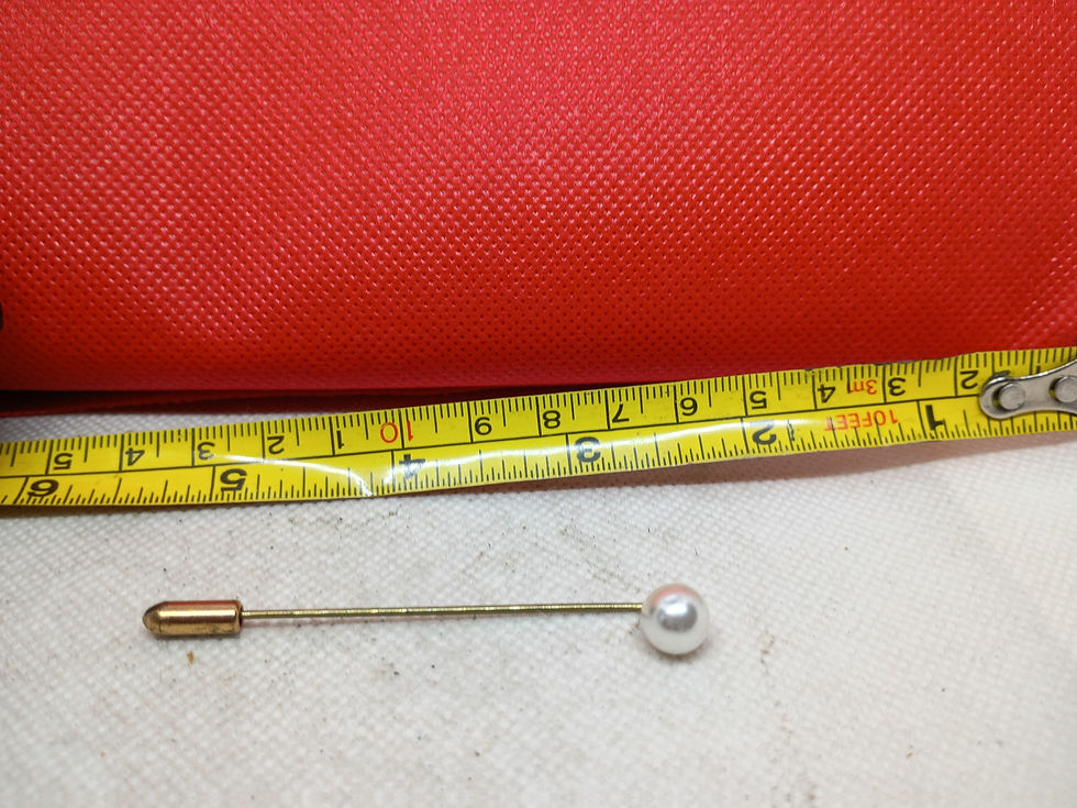 Thumbnail: 2.75" a vintage gold-tone stick pin featuring a single iridescent pearl and cap