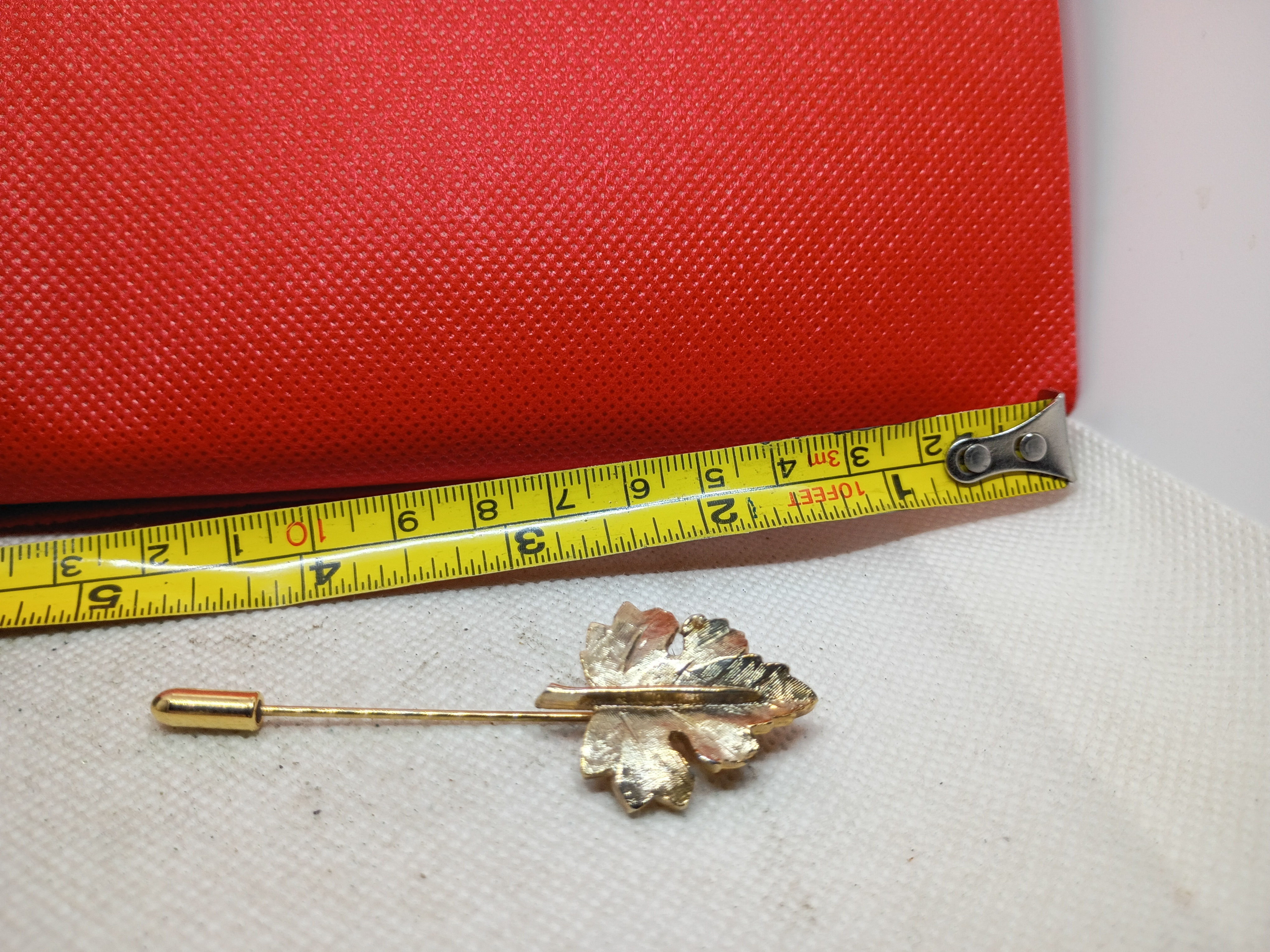 3" A vintage gold-tone textured maple leaf stick pin