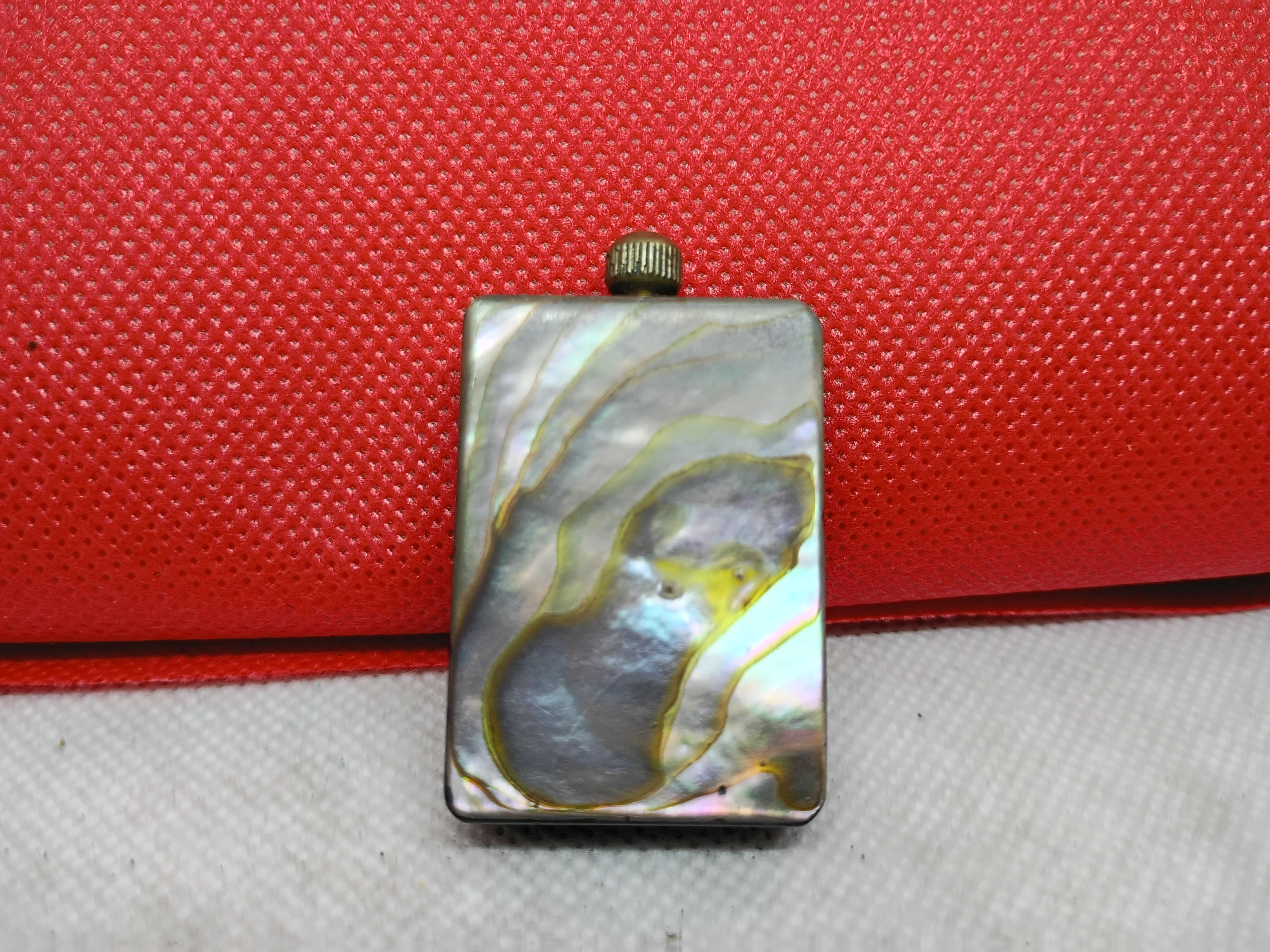 1.5" A rare vintage permanent match pocket lighter with a pull-out striker wand