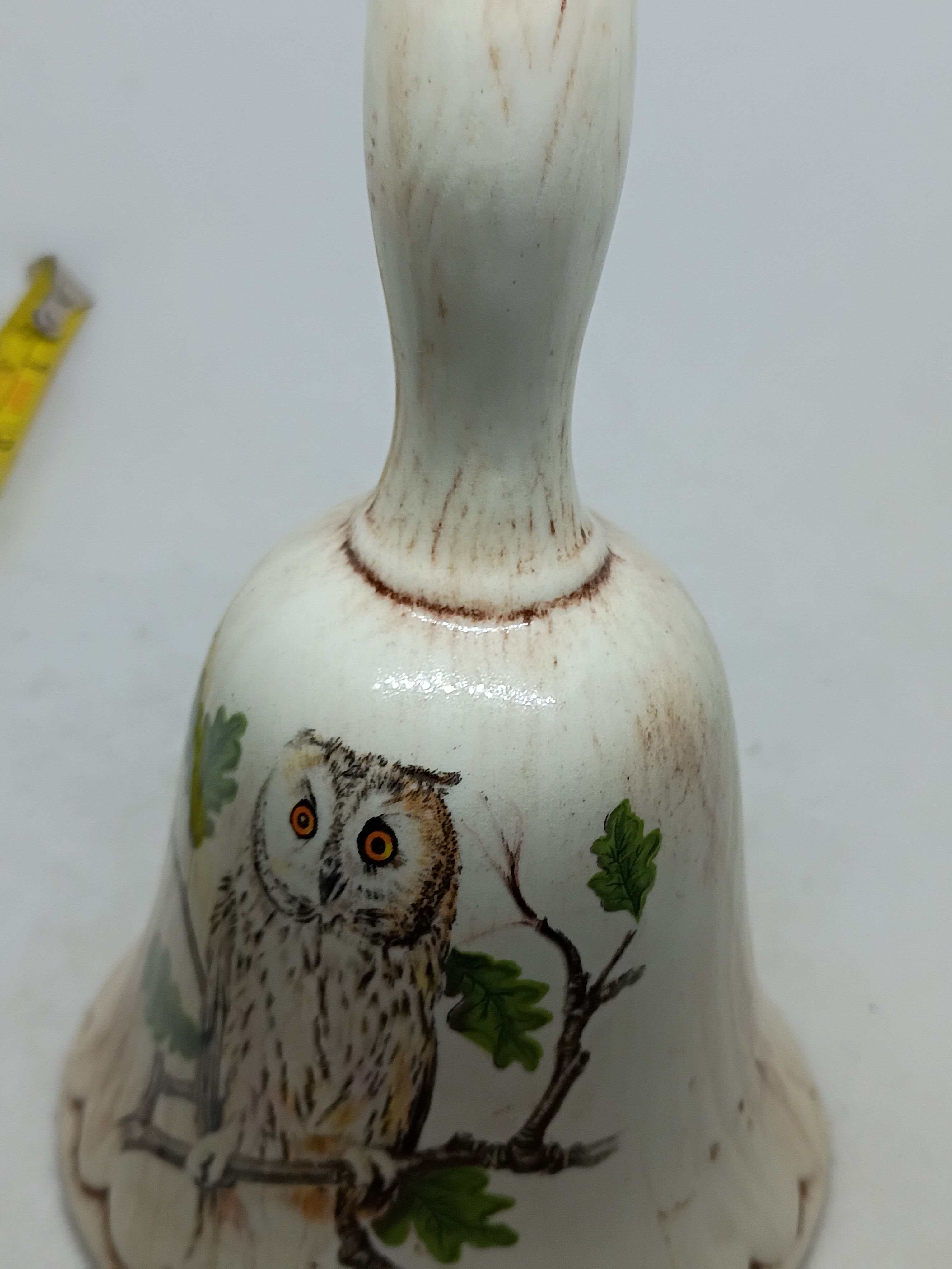6"  tall- White porcelain bell with Owl design