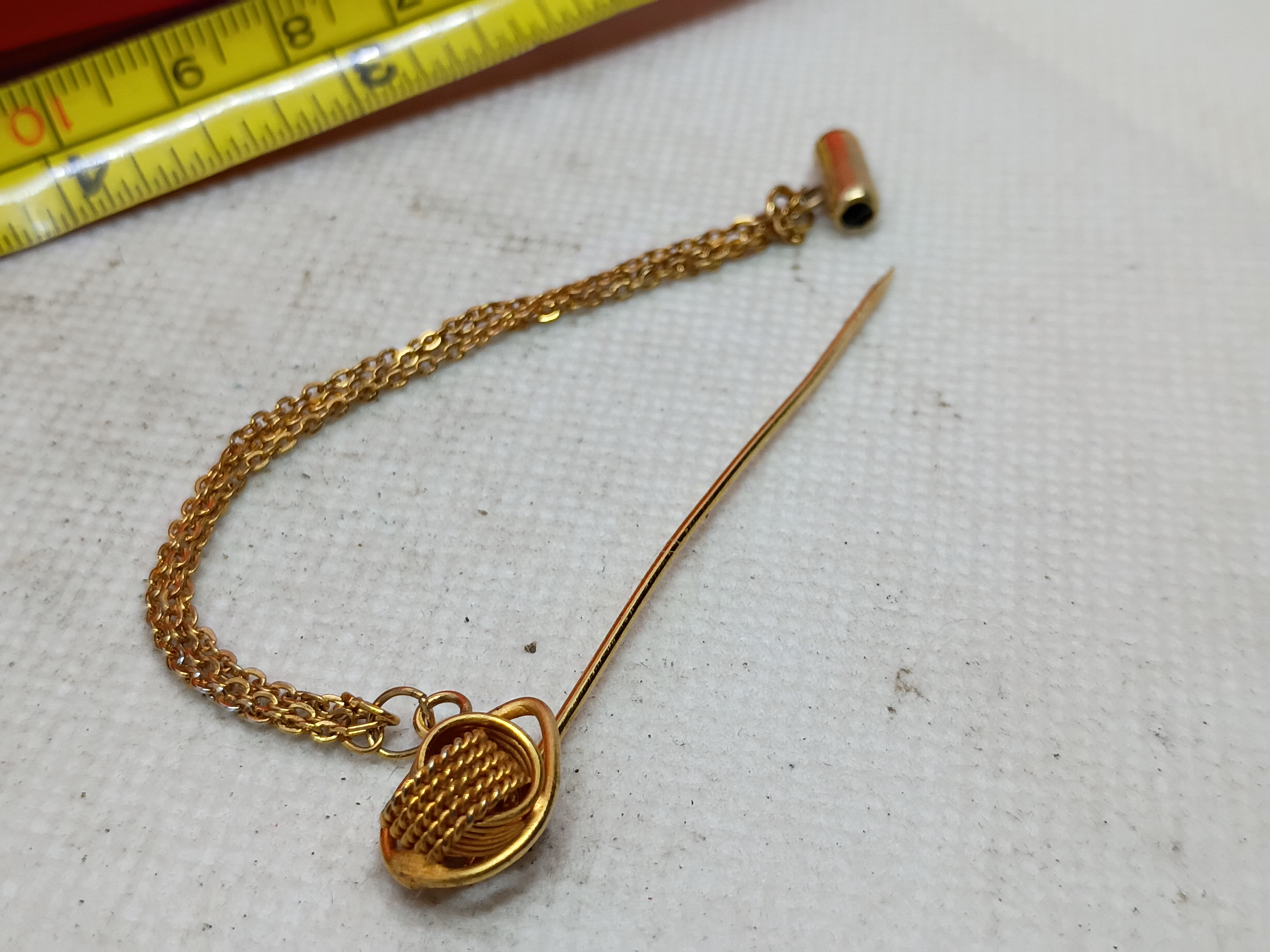 3" Vintage textured, wire-wrapped knot design and a dangling double chain & cap