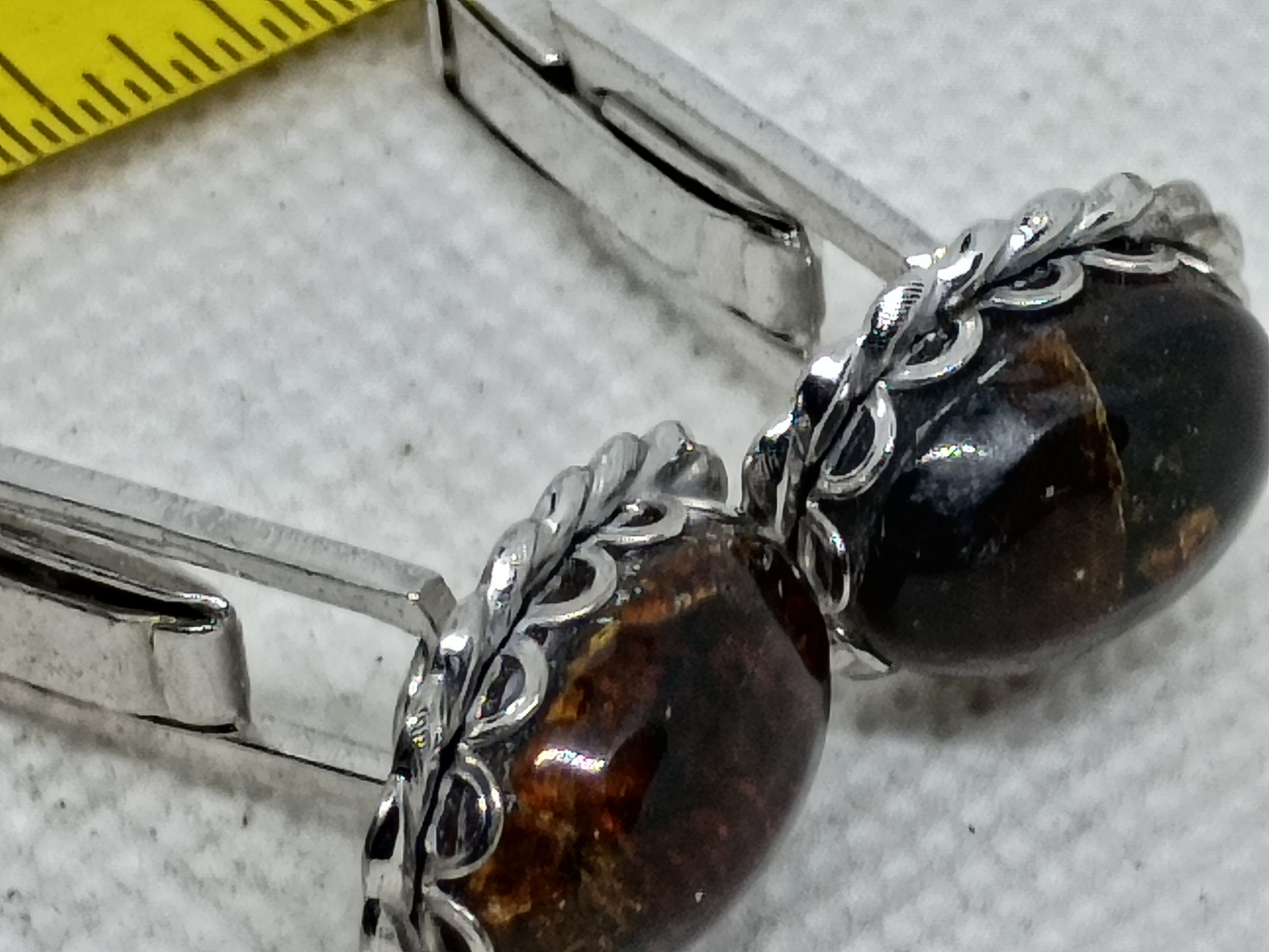 Set of vintage silver cufflinks featuring bezel-set Baltic amber stones