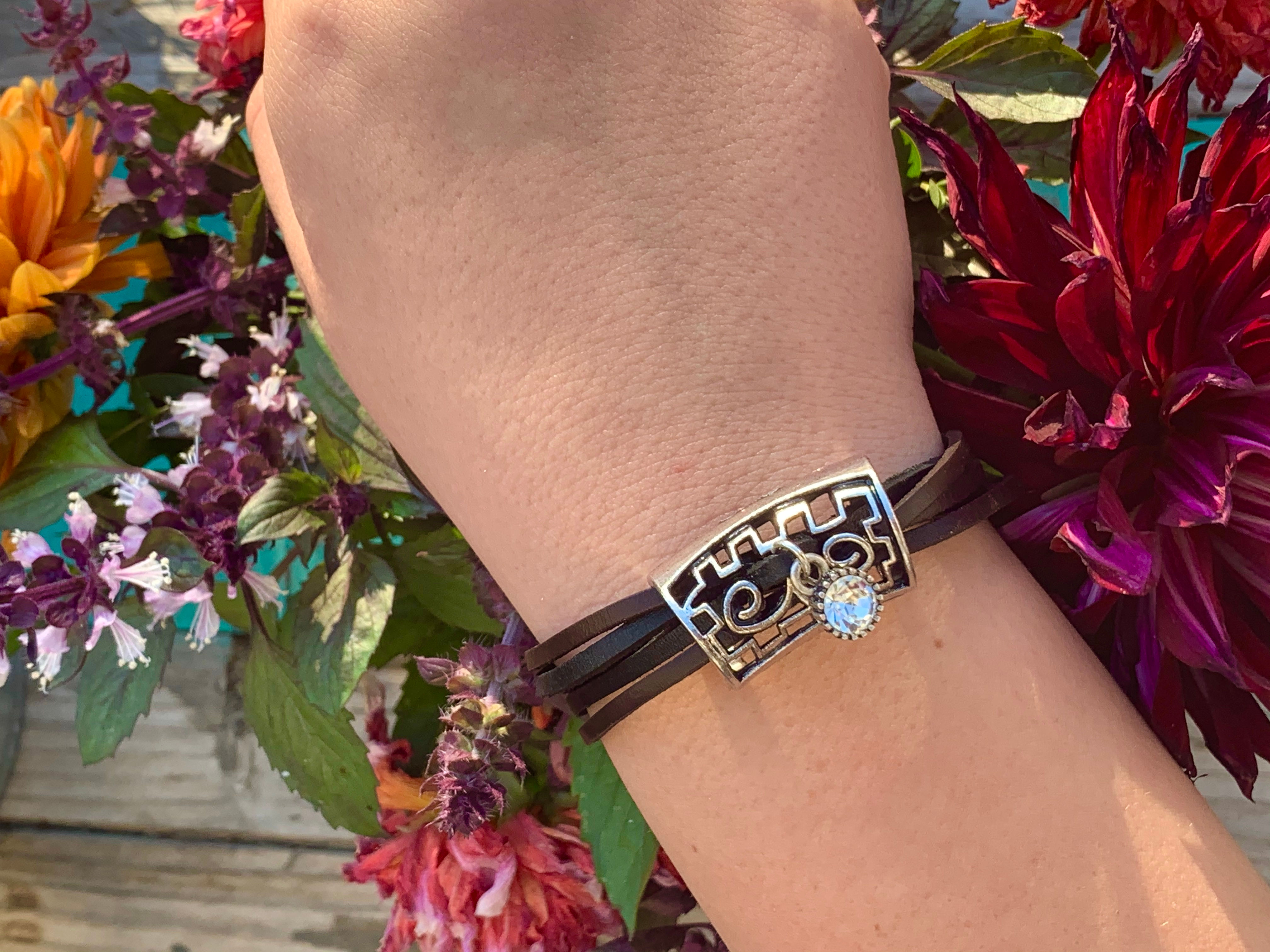Black and dark brown leather cord with rhinestone charm