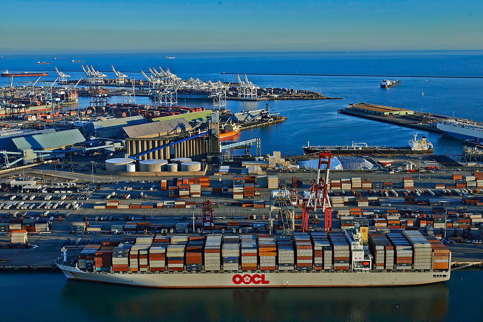 Aerial view of Port of Long Beach with fully-loaded container ship in the foreground