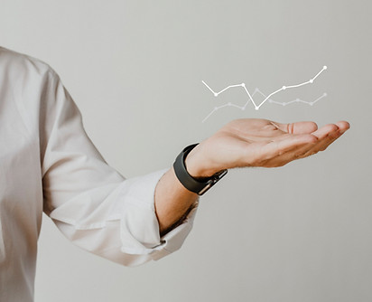 digital-graph-with-businessman-hand-overlay.jpg