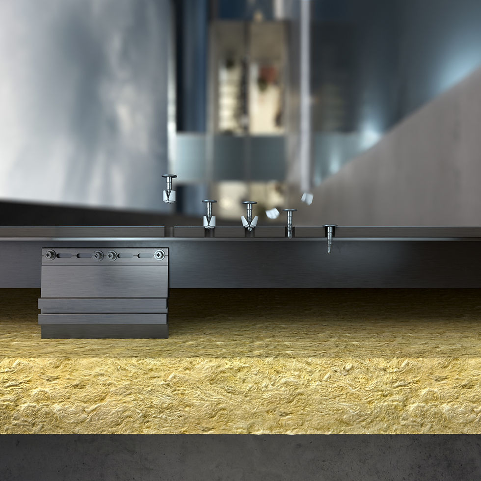 Metal screws and a bracket positioned on a steel surface, with insulation material beneath. Blurred industrial background creates a sleek mood.