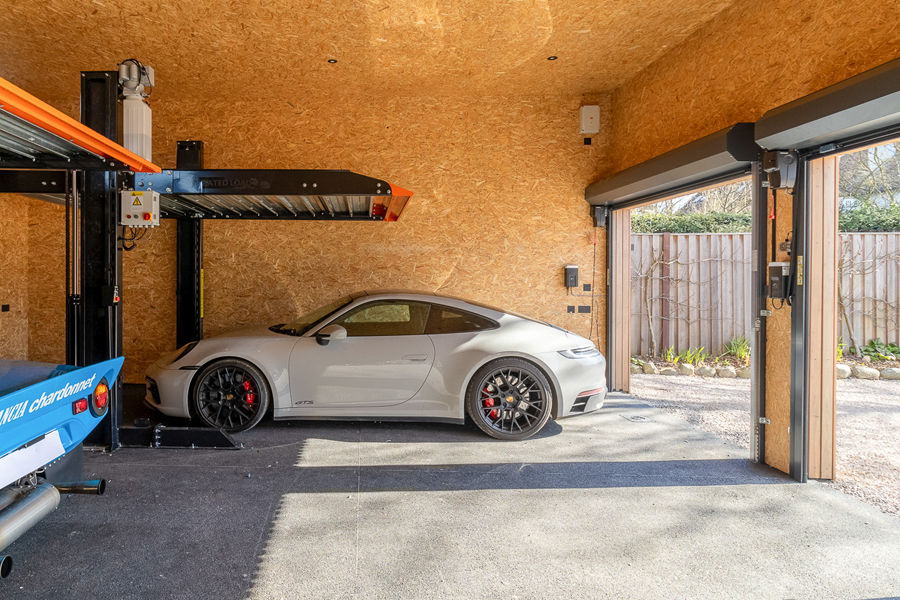 Hörmann RollMatic Roller Doors For Striking 9-Car Garage