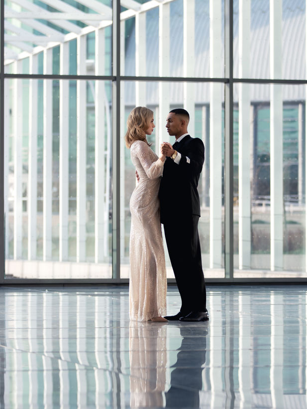 well-dressed couple dancing romantically in styled photoshoot in Toronto, shot on canon r5 