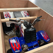 Quad Bike packed inside timber crate with internal supports and fixings