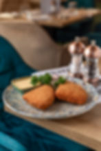 Deep-fried Trappista cheese with rice and tartar sauce (vegetarian)