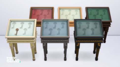 Présentoirs décoratifs en plusieurs coloris avec motif de clés, mobilier exclusif de l’événement Héritages Perdus.