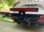 Thumbnail: Kody Technologies rack light on a 1Up Equip-D bike rack mounted on a white Toyota Sienna.
