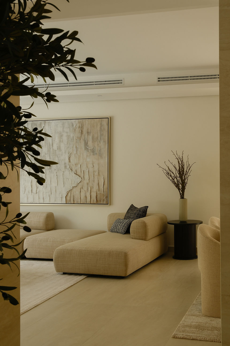 Layered neutrals and clean lines in a timeless living room setup