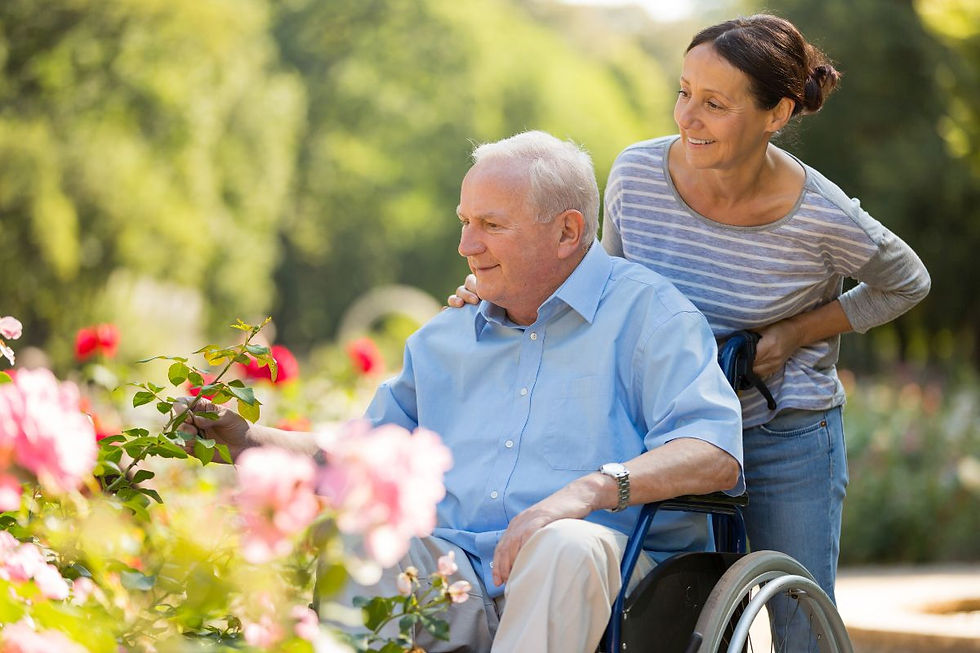 why home care is better man in wheelchair being pushed