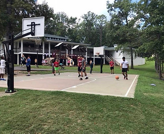Campers play basketball