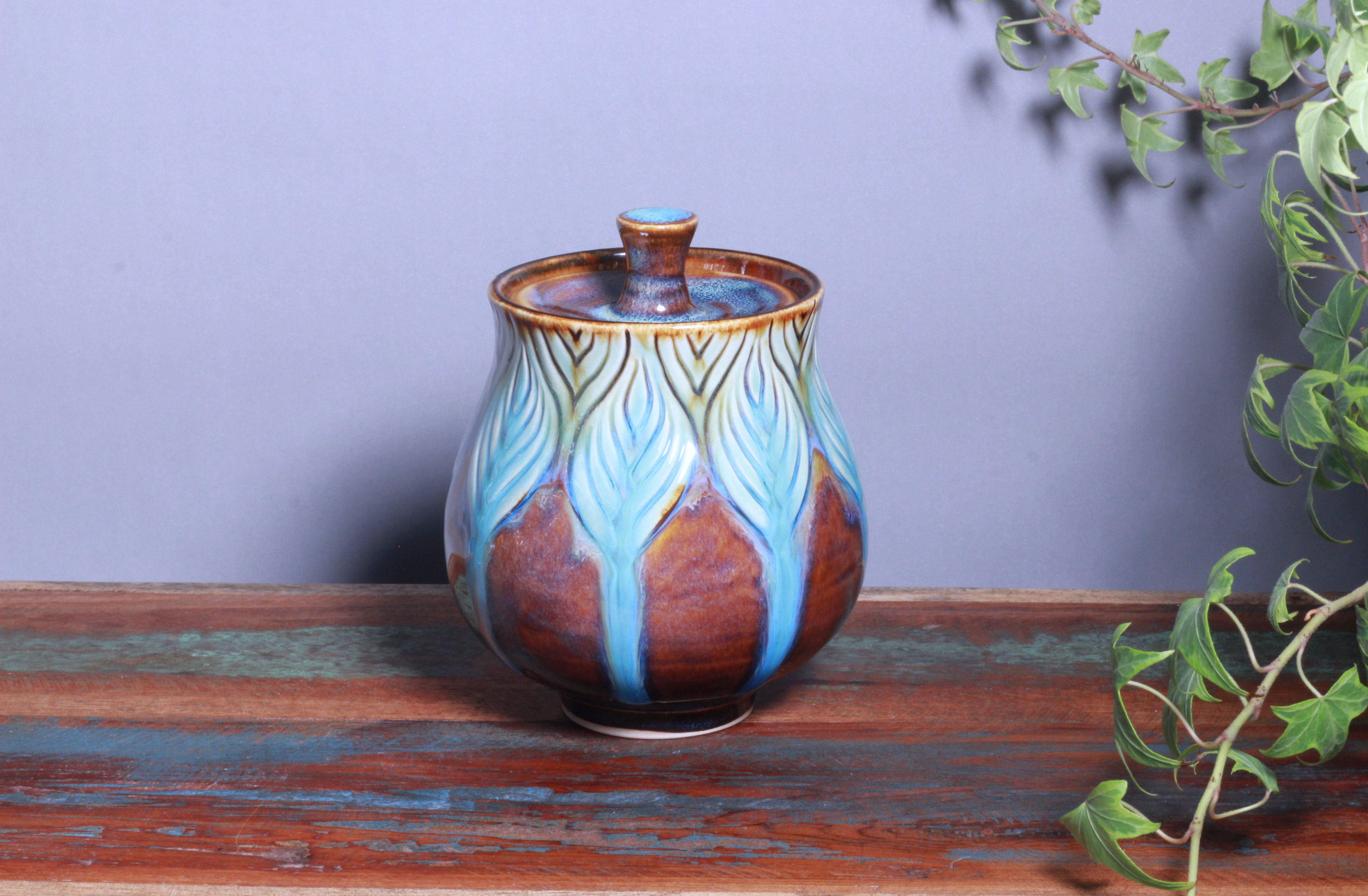 Curvy Art Nouveau lidded pot