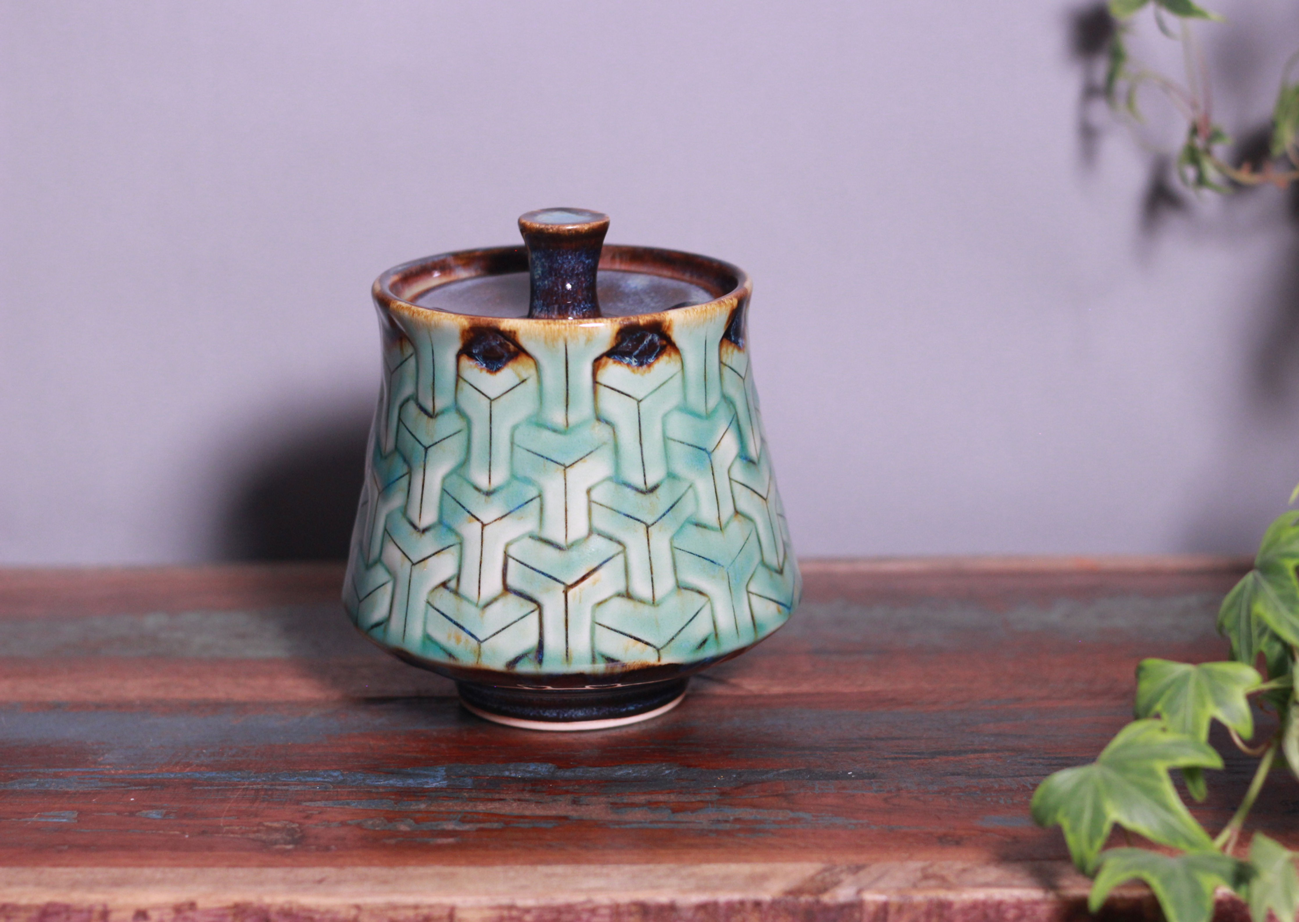 Geometric design lidded pot