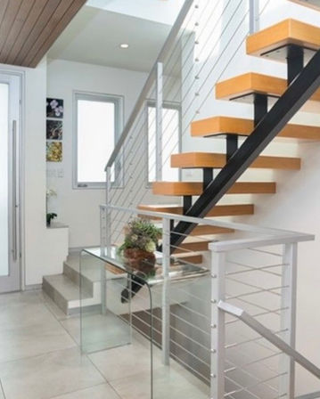 Before photo of entry with cable railing system
