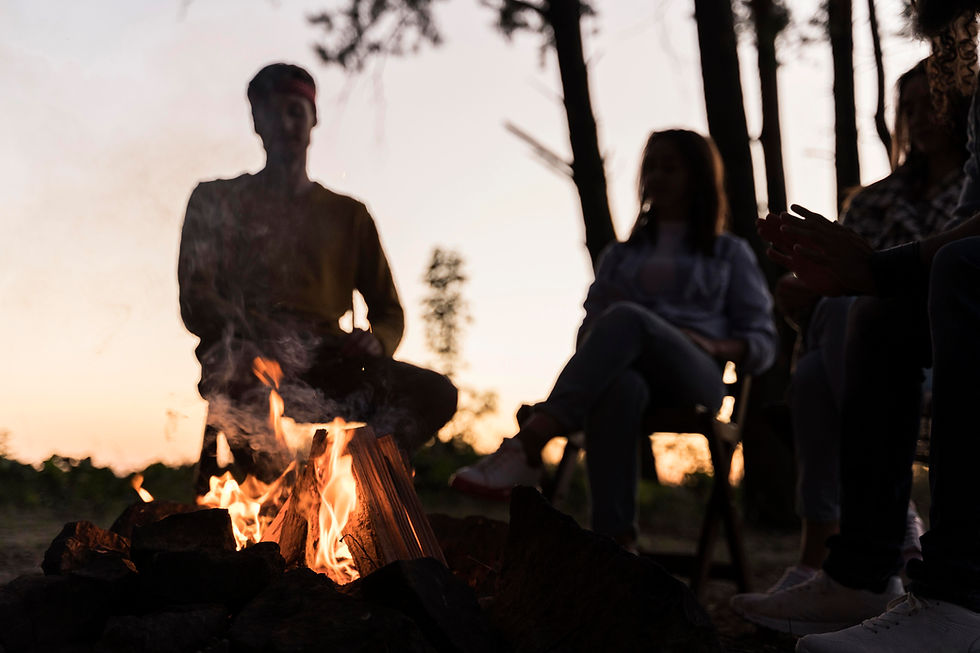 friends-dusk-gathering-around-fire (1).jpg