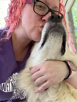 Dog getting snuggled