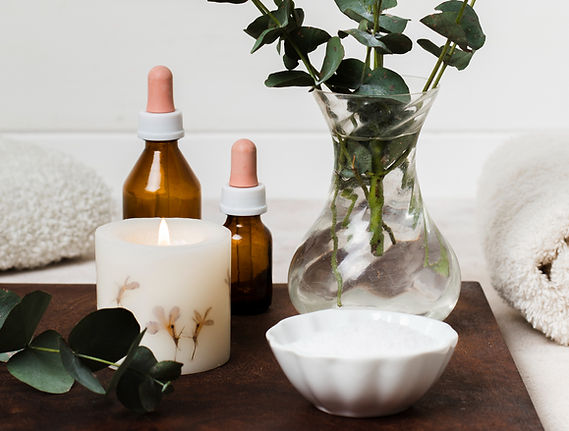 spa-composition-with-lit-candle-plant_edited.jpg