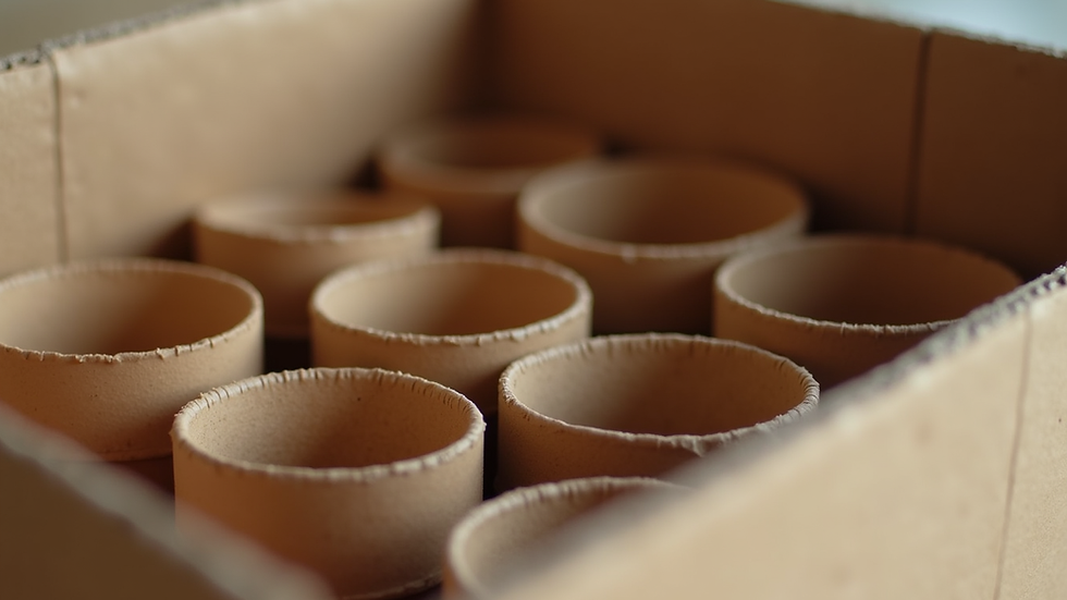 Close-up view of cardboard cups inside a shipping box