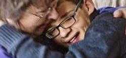 cropped-Toby-Yvonne-cuddle.jpeg