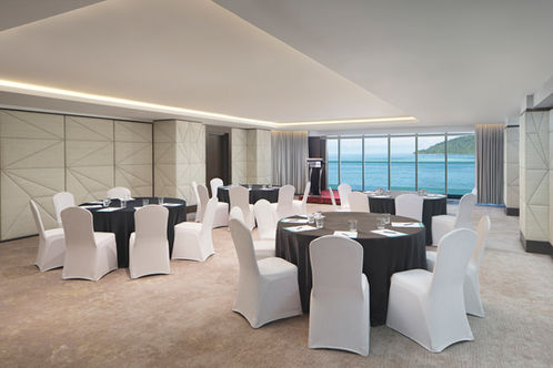 High-end photography of elegant conference room with ocean view