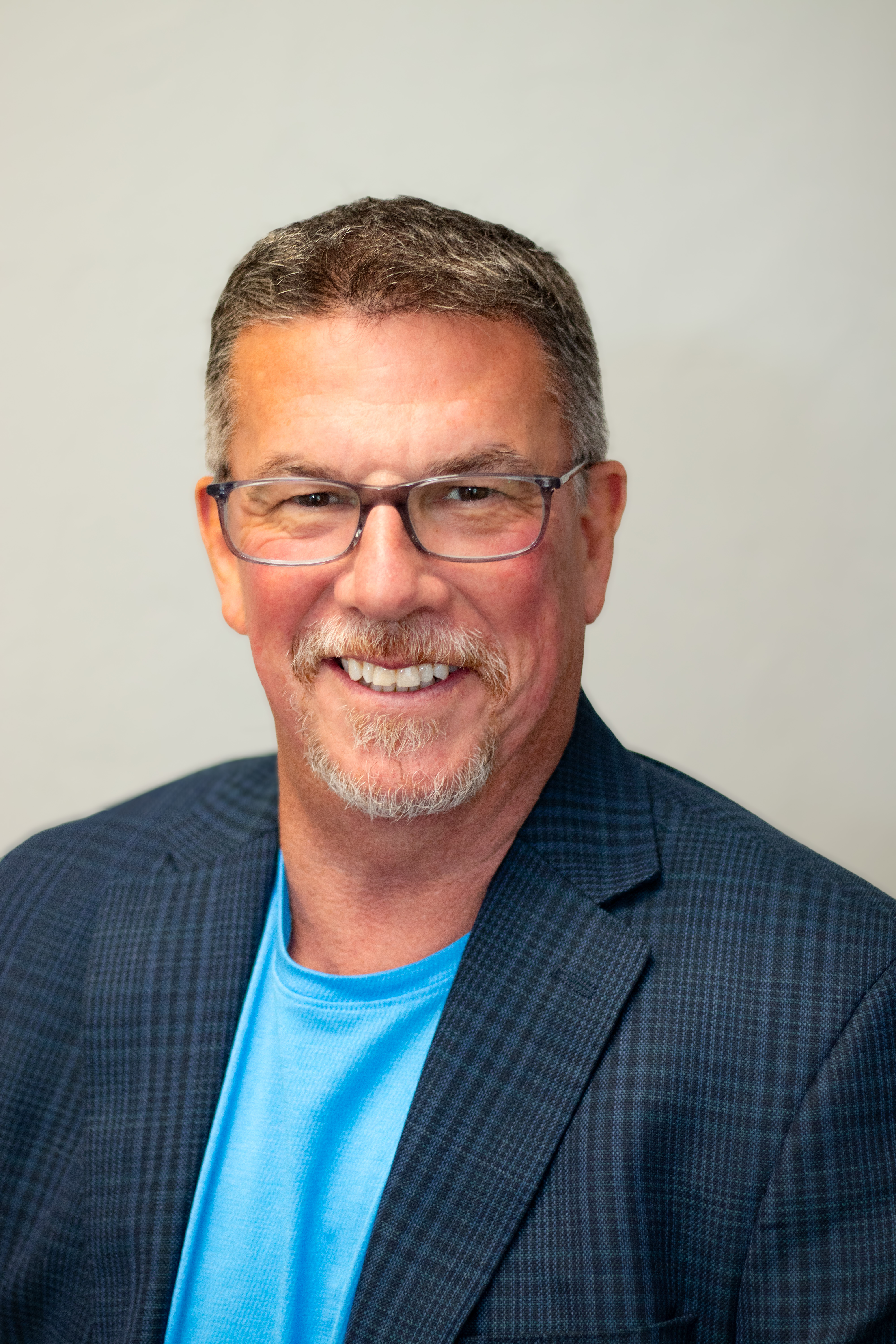 Smiling man in glasses