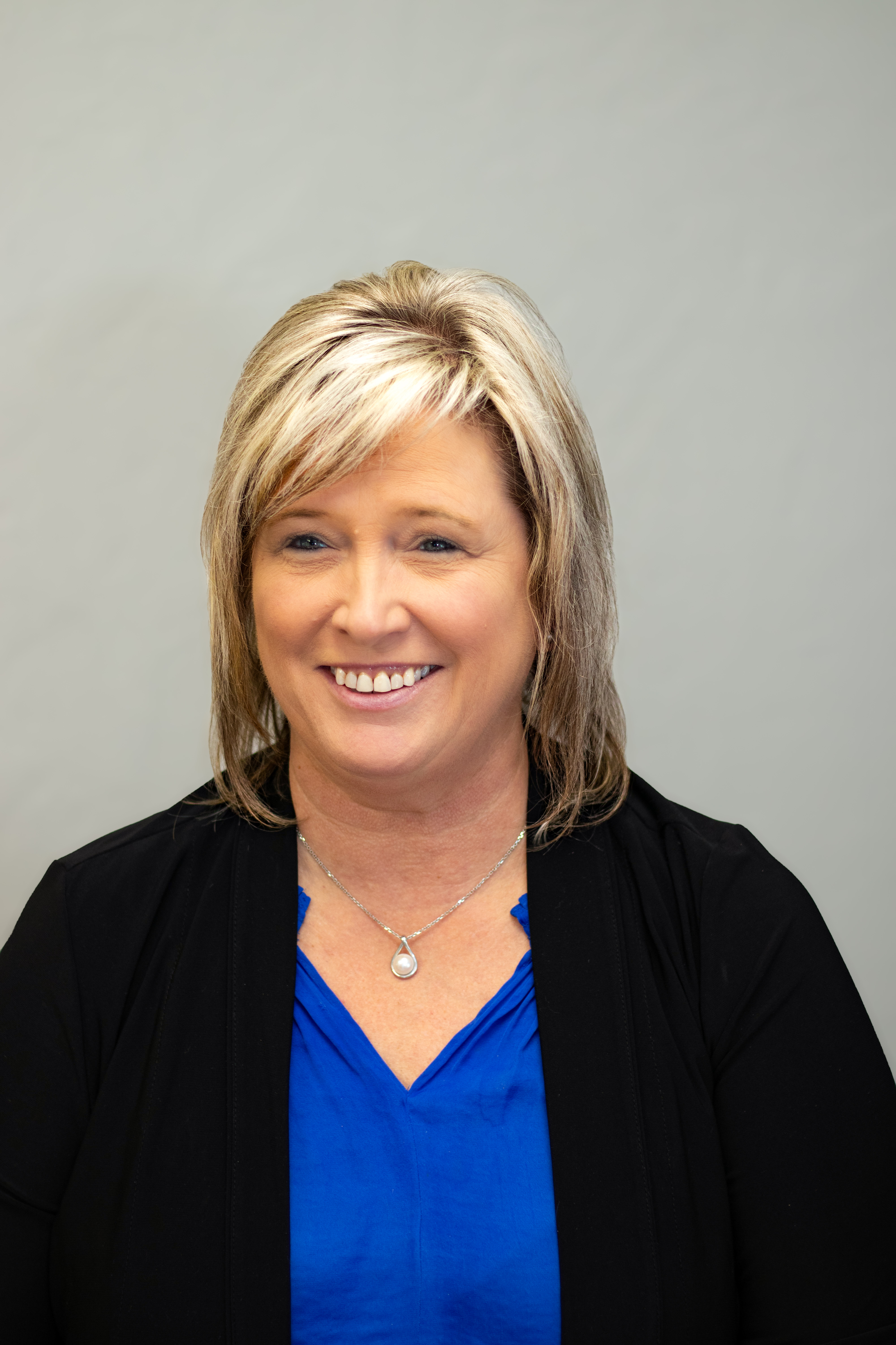 Smiling woman with blonde hair