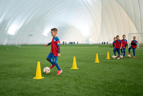 full-shot-kids-training-field.jpg