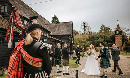 Sophie and Kieran wedding at Tudor Barn Burnham with Julia Read bagpiper