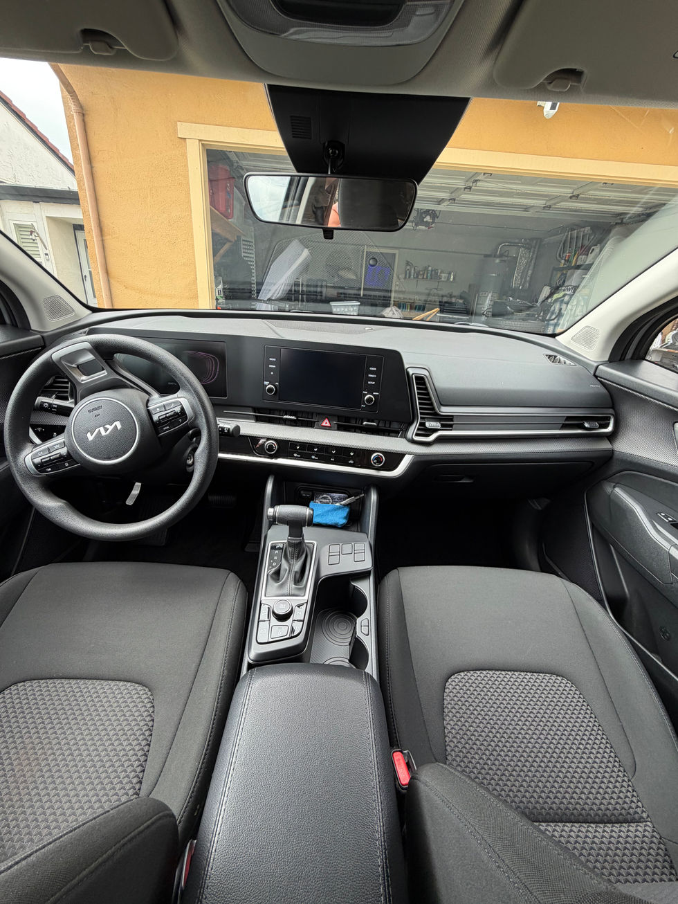 Clean car interior showing dashboard and front seats