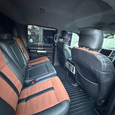 Car interior with black and tan seats
