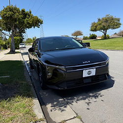 Black Lucid Air electric car parked on a street