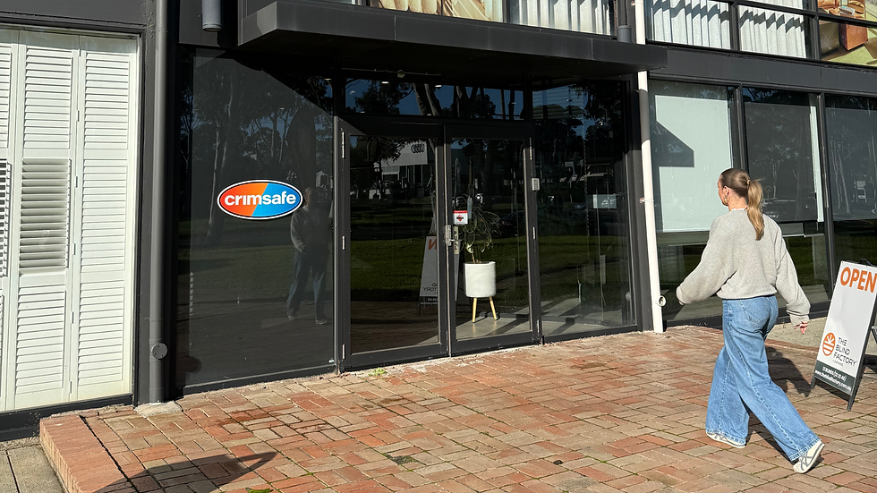 Customer walking into a blinds and curtains showroom