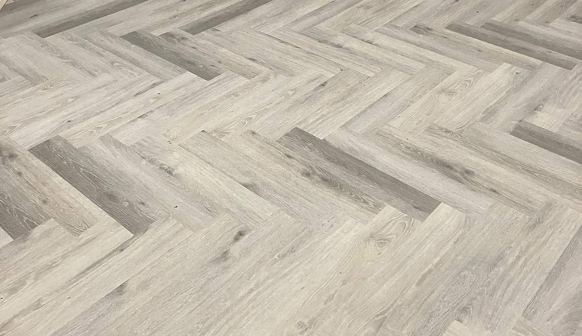 grey herringbone click LVP flooring