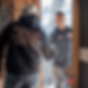 Two-workers-in-uniform-shaking-hands-at-a-doorstep.png