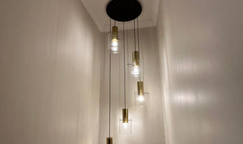 Luxury chandelier installation completed by Energiserve in Sunningdale, Berkshire.